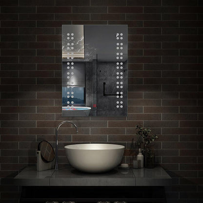 Dotykové LED zrcadlo do koupelny AICA J1601C s rozměry 39x50 cm – moderní proti zamlžování zrcadlo s chladným bílým LED osvětlením (6000K), dotykovým ovládáním a topnou fólií. Elegantní hliníkový rám, úsporné LED pásky s ochranou IP67 proti vlhkosti a prachu. Prémiové HD zrcadlové sklo s leštěnými hranami, ideální do koupelen, toalet nebo wellness prostor. Funkční řešení pro dokonalé osvětlení při holení nebo líčení bez zamlžování. Technické parametry: 12W výkon, napájení 220-240V, montáž vertikální/horizon